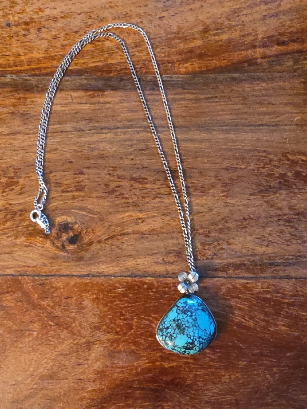 Turquoise Teardrop Pendant Necklace with Silver Floral Accent